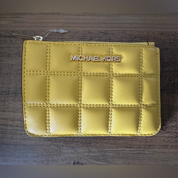 Michael Kors Handbags - Michael Kors Quilted Jet Set Travel Wallet w/Zip Coin Pouch. Daisy Yellow. NWT.